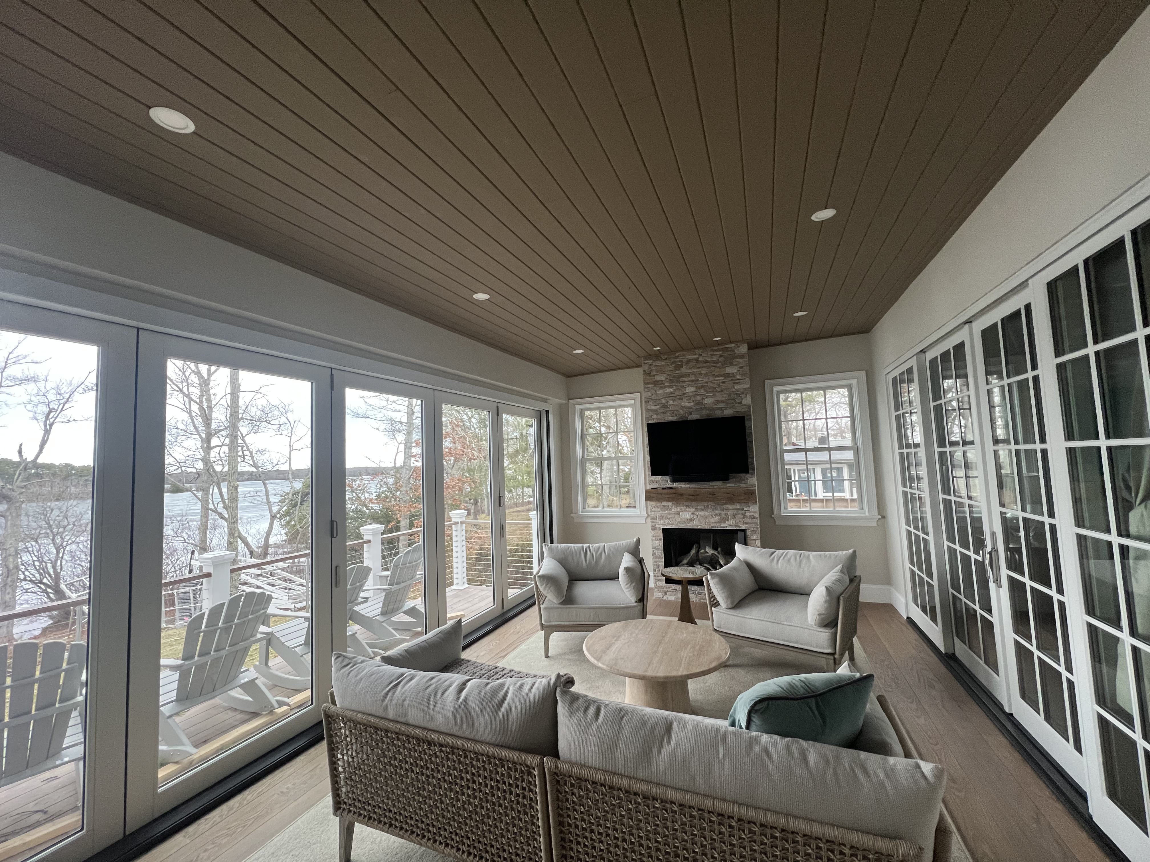 Wood ceiling and finish details in a waterfront sunroom.