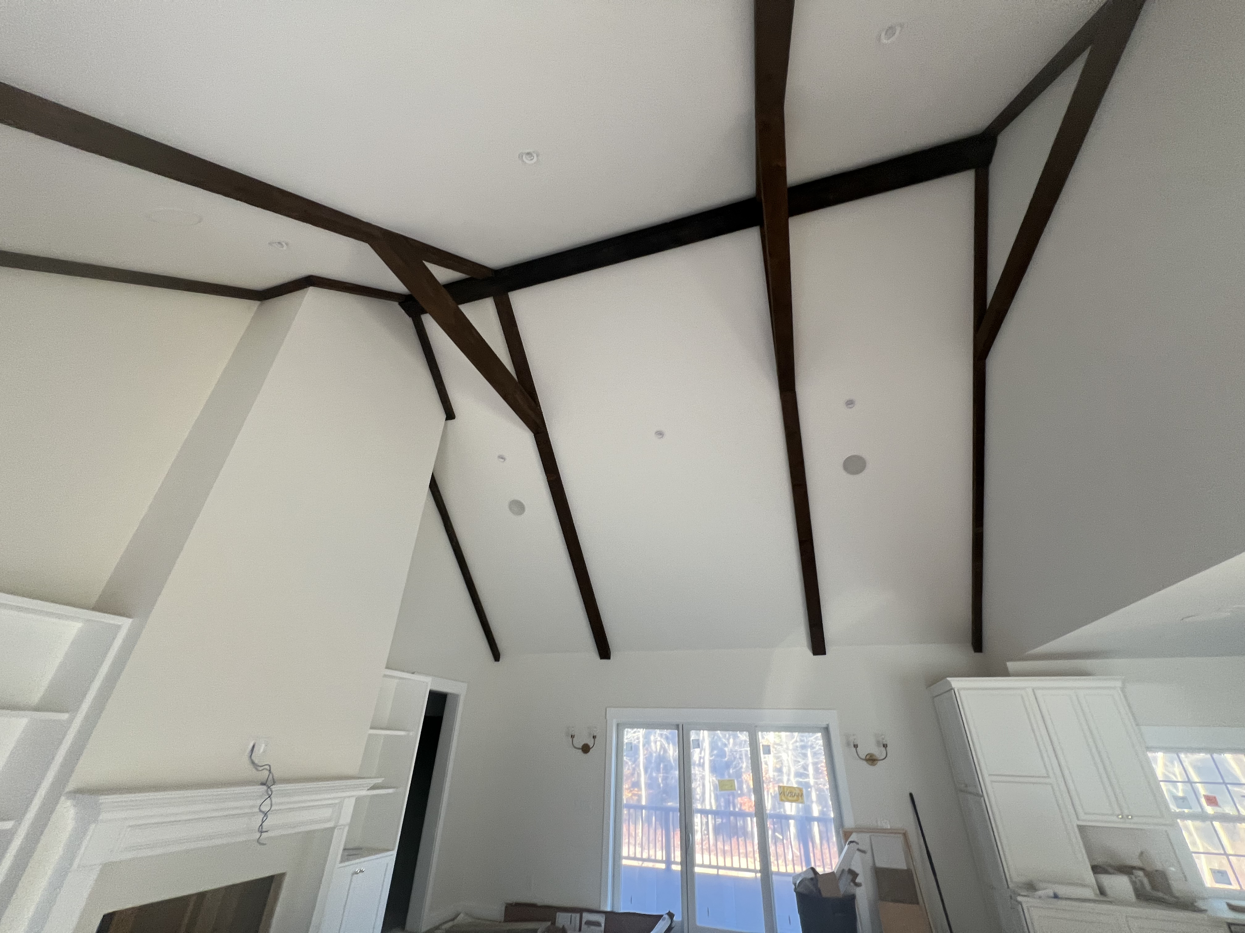 Dark wood ceiling beams and interior trim.
